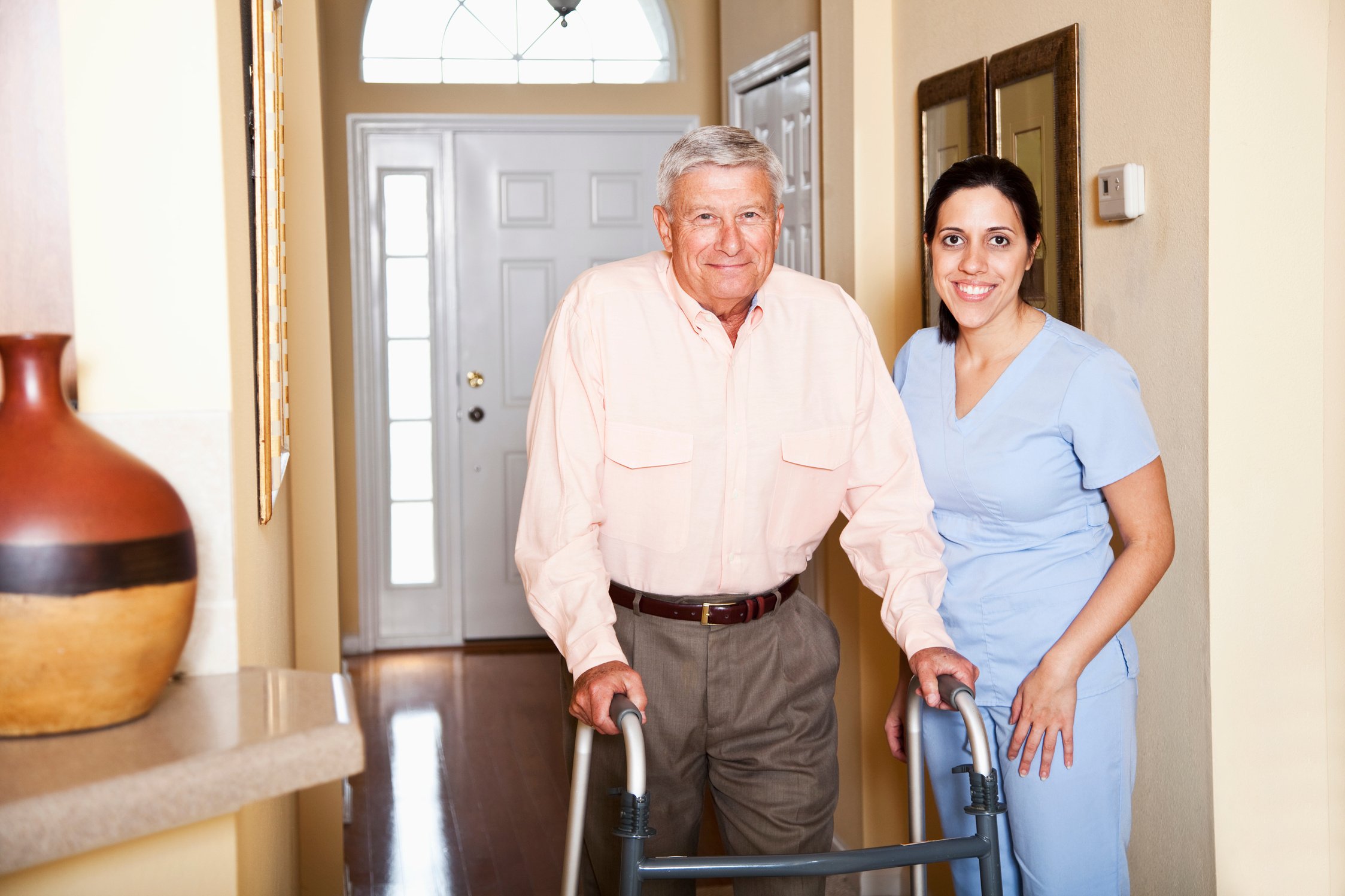 Home health aide with senior man